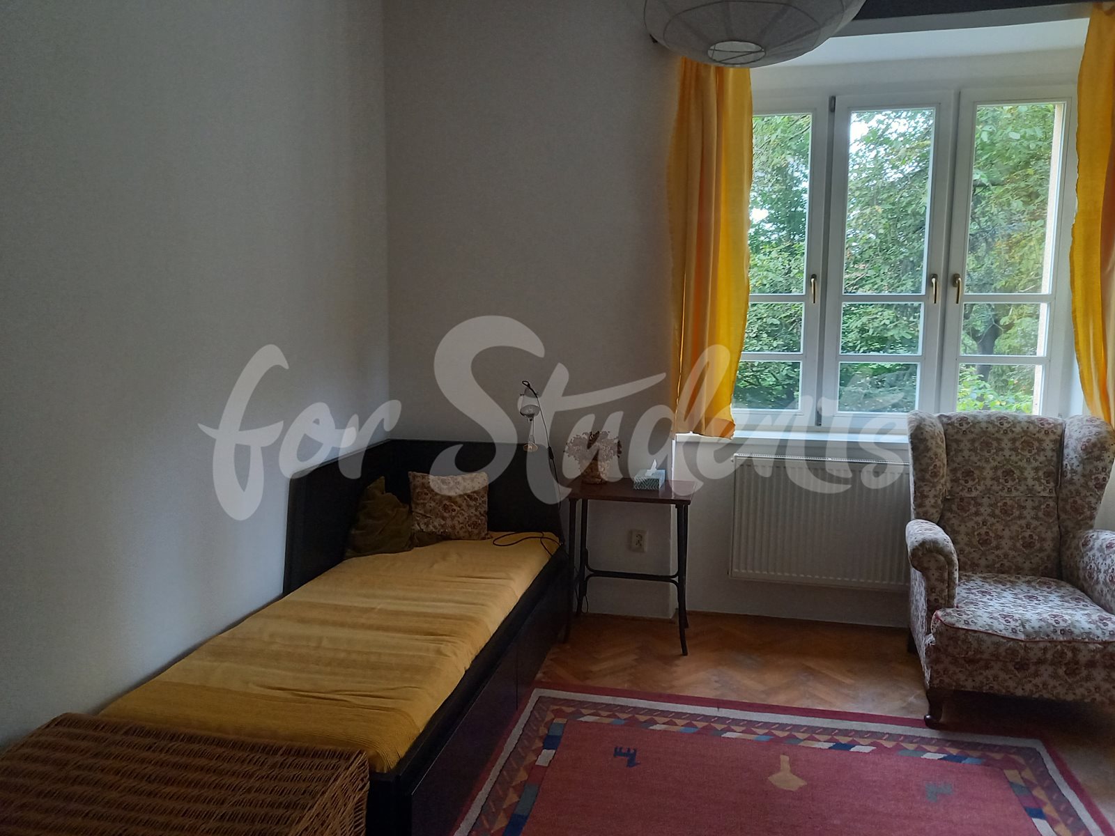 One room in a spacious three bedroom apartment, Prague