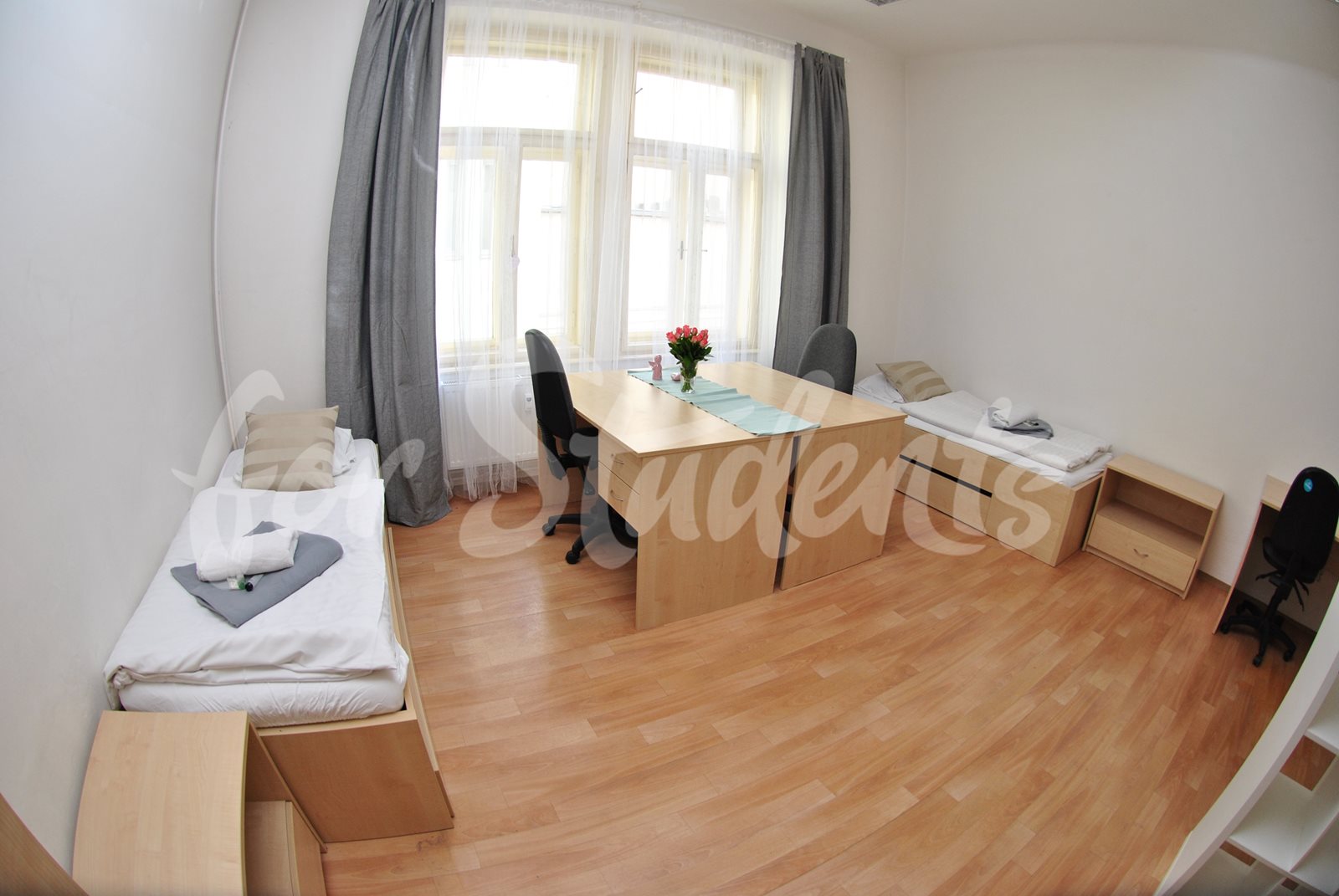 Three beds available in a shared room in a shared apartment on Dominikánské náměstí, Brno 